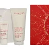 Clarins Baume Set 260ml Moisture Rich Body Lotion 200 ml / Exfoliating Body Scrub 30 ml / Hand and Nail Treatment Cream 30 ml /Large Pouch fles en verpakking